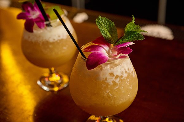 Flower Cocktail Hour- at Max's South Seas Hideaway- includes a special recipe and these love edible orchids!