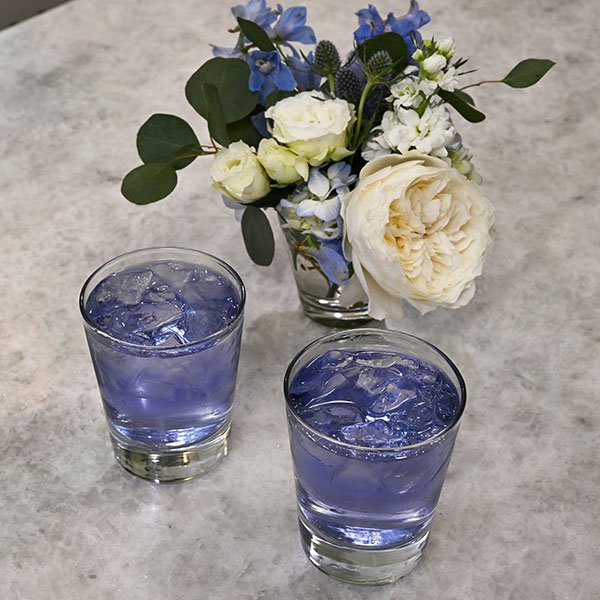 The Secret ingredient to this #flowercocktailhour concoction is Blue Butterfly Sweet Peas- that have been infused in traditional vodka!
