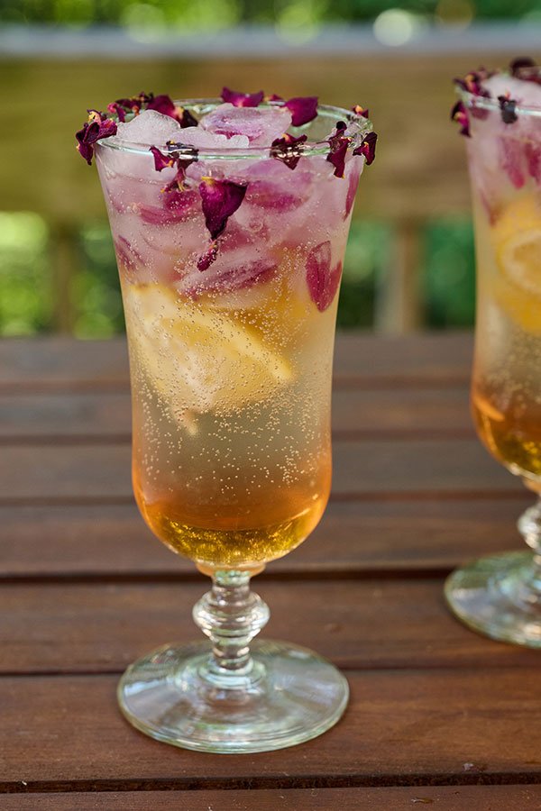 This Flower 0 Proof Libation (Mocktail) features Organic Rose Petals, Honey, Ginger and Rose Elixer!