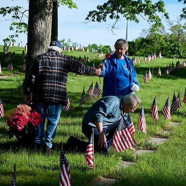 Placing on all 5000+ Graves in the Grand Rapids Veterans Cemetery is a big job- made easy by Amazing Volunteers and Flower Friends!