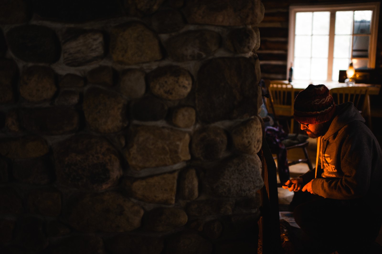 cabin with a fireplace | winter log cabin photography | ontario travel photography