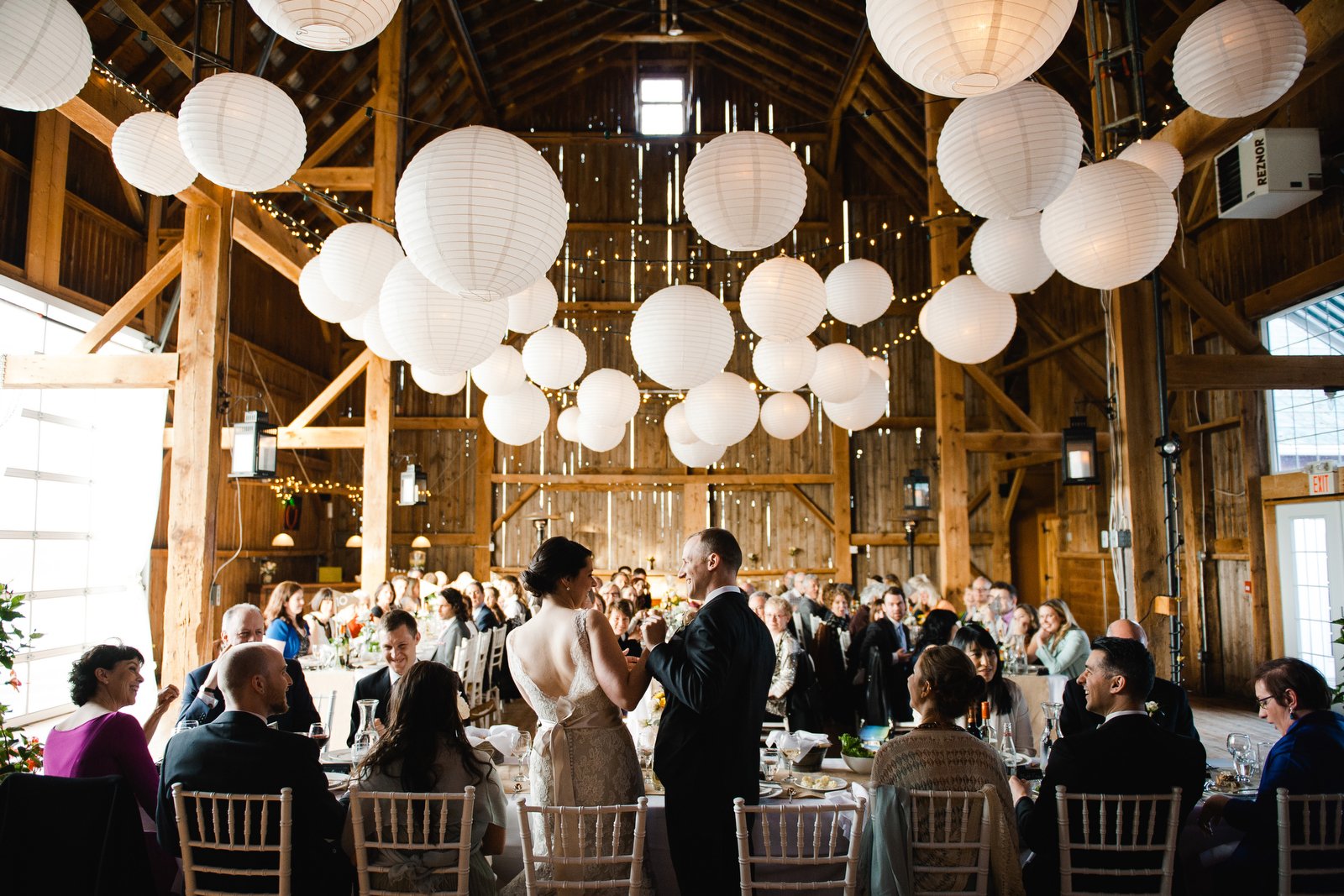 reception in the big barn | fields on west lake wedding | picton wedding photographers 