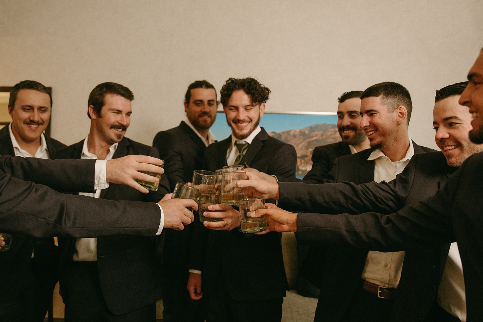 Groom and groomsmen toasting