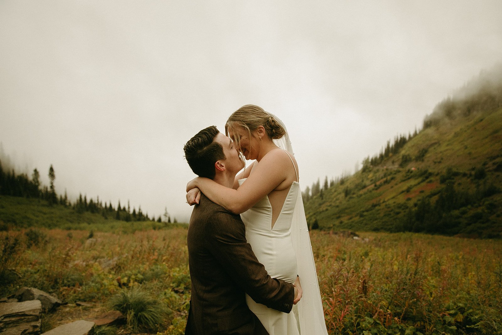 Bride and groom dancing during their national park elopement