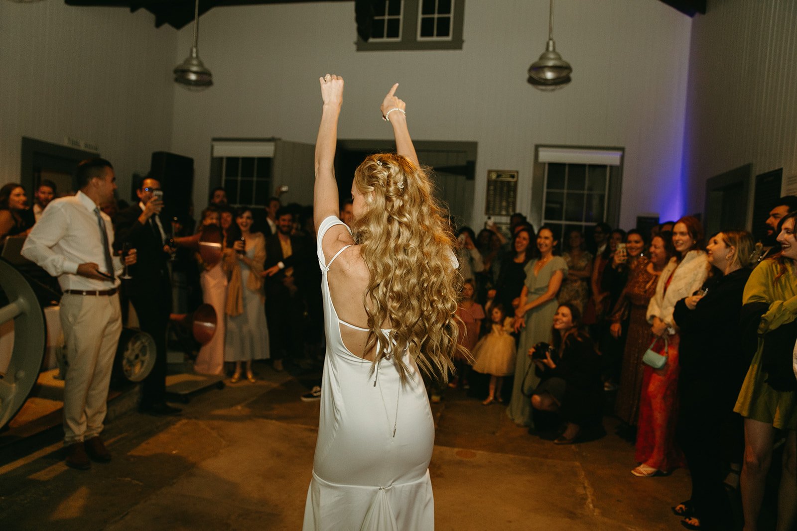 Bride dancing on the dance floor during wedding reception