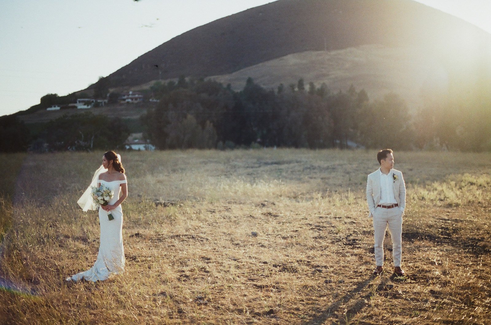 Outdoor San Luis Obispo Wedding day with a white wedding decor and florals