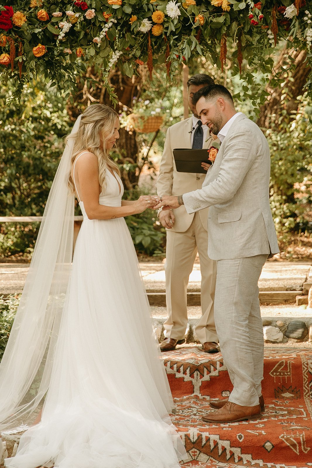 Intimate outdoor Wedding ceremony in California with Rustic colors and summer florals