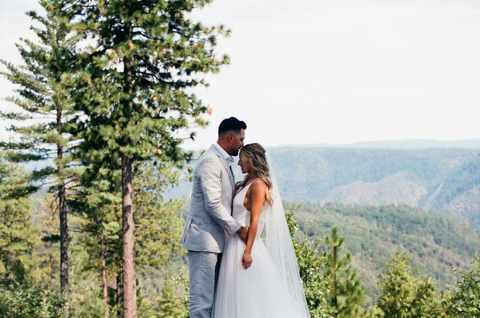 A beautiful intimate outdoor wedding day in Foresthill California with rustic and summer decor