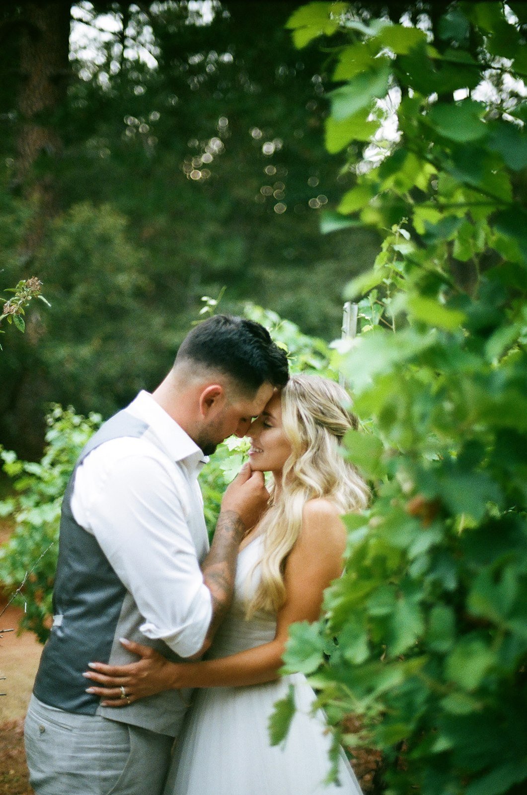 A beautiful intimate outdoor wedding day in Foresthill California with rustic and summer decor on film