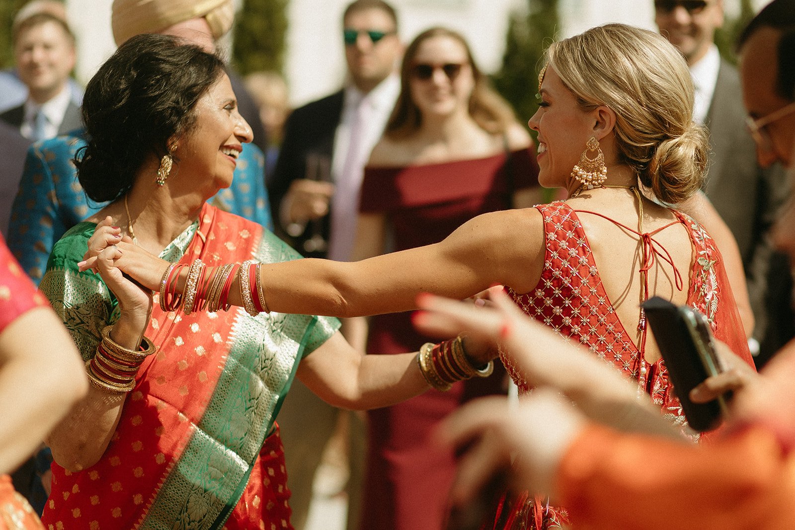 Beautiful Bride dancing with mother in law during reception