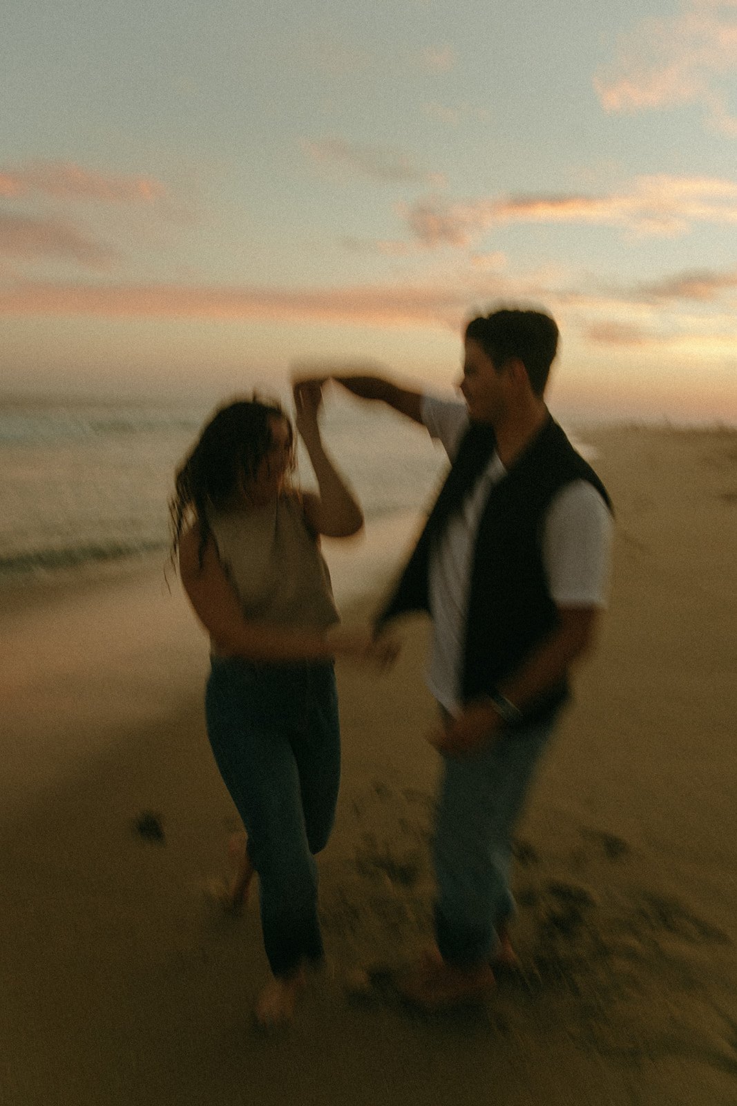 Newport Beach Engagement photo session on the beach during sunset