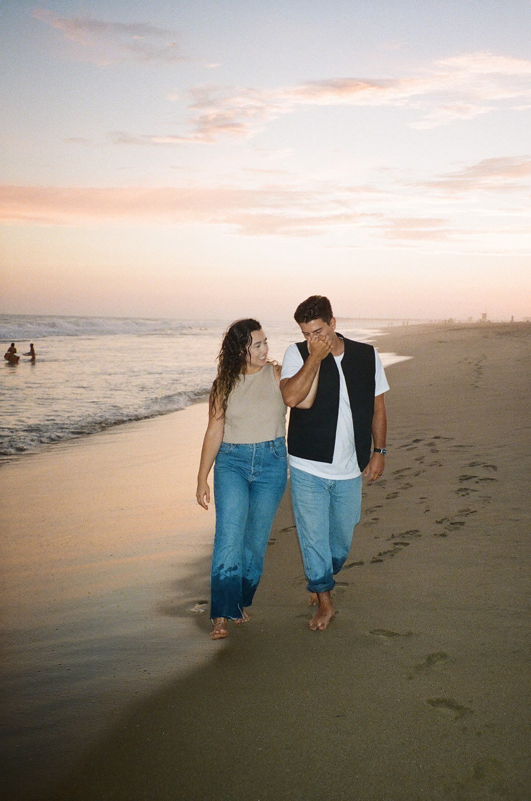 Newport Beach Engagement photo session on the beach during sunset on film