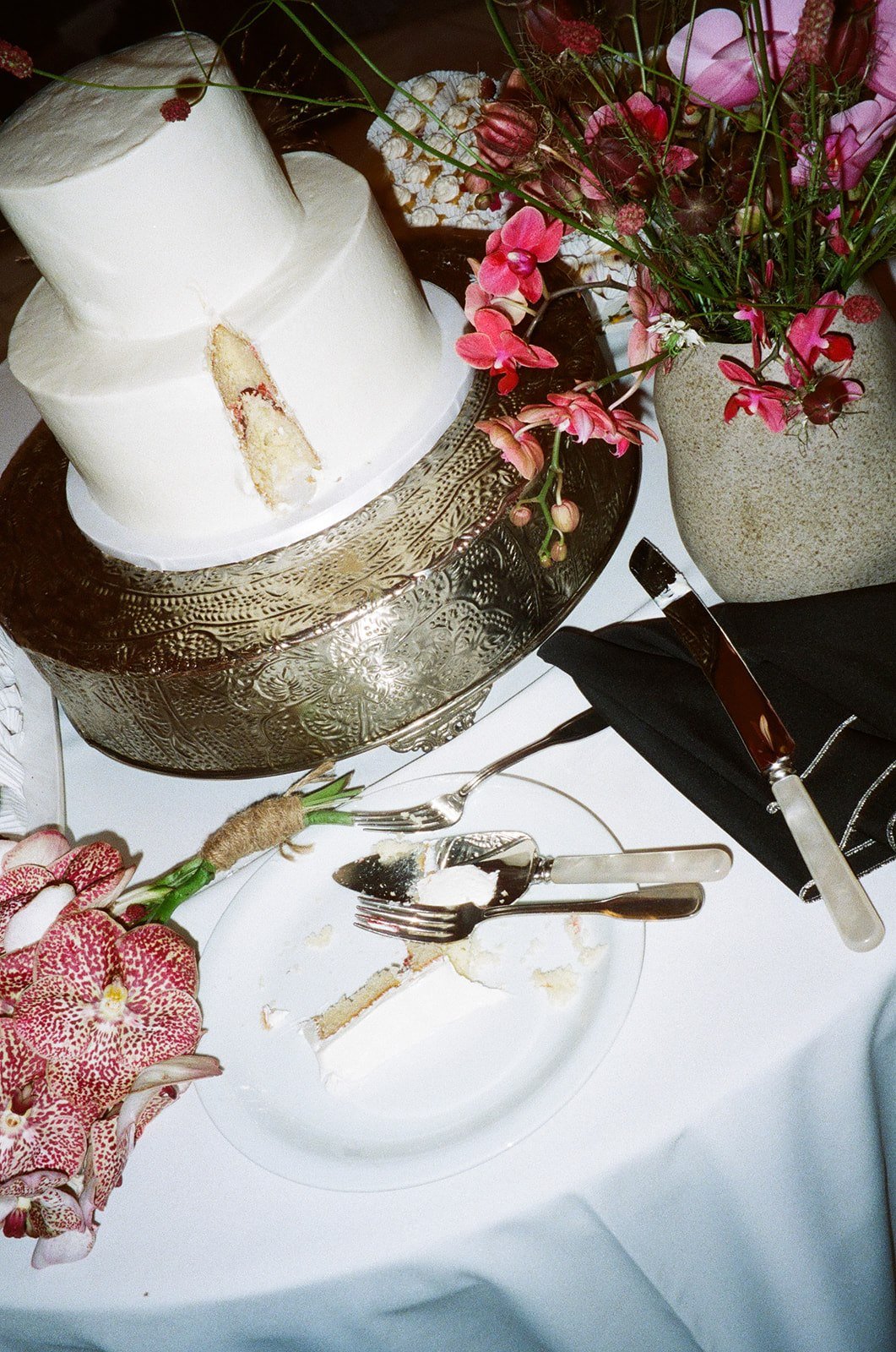 Film photo of white wedding cake
