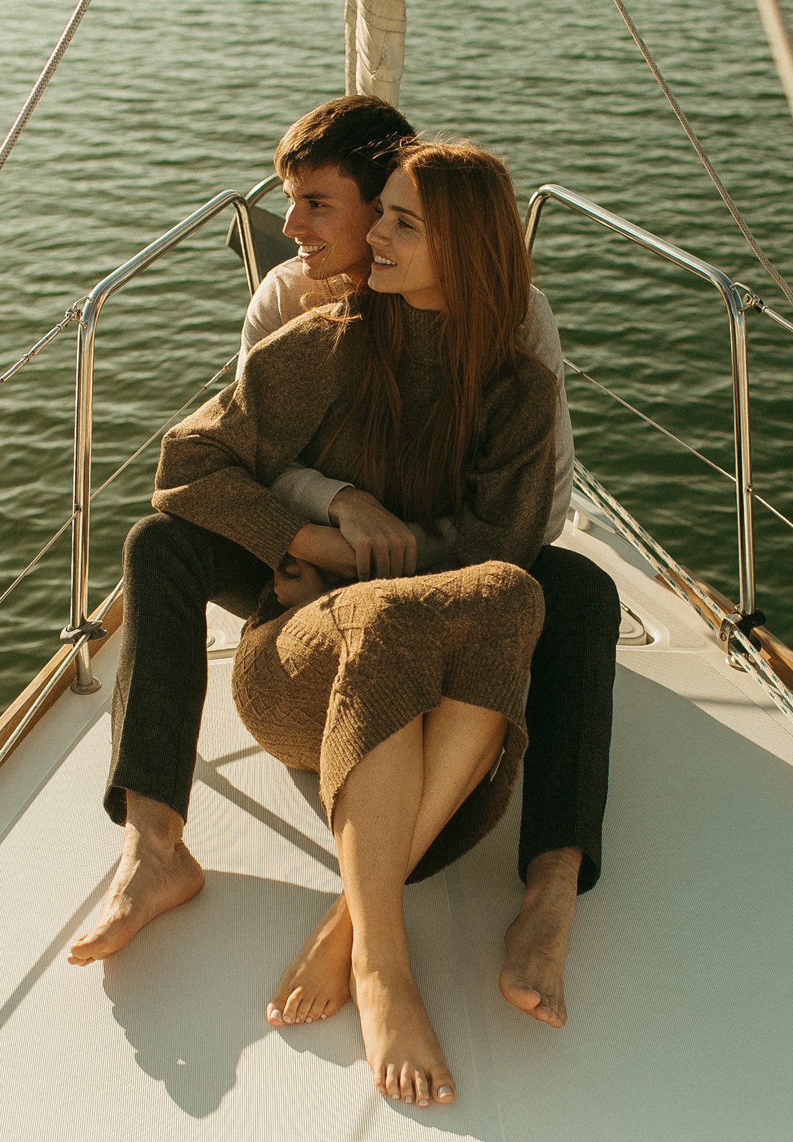 Unique Newport beach engagement photos on a sailboat
