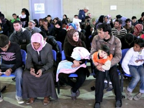 US town votes unanimously to ban Syrian refugees...