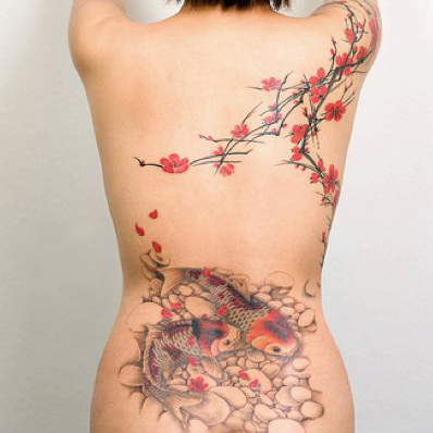 A stunning back tattoo with a koi fish Source: KoiStory