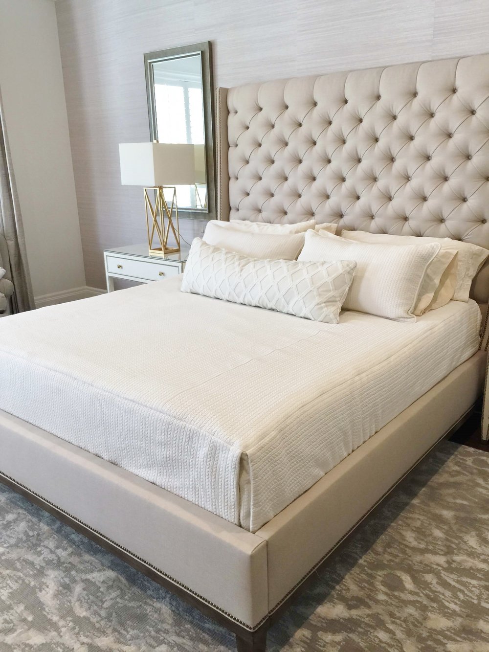Bedrooms - Change out the wood headboard for a softer, more luxurious
