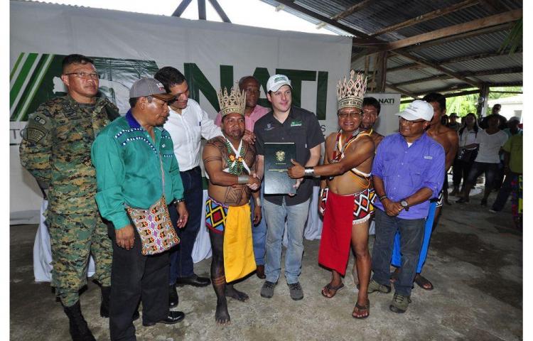Arimae receives its land title during a ceremony in the community. Photo courtesy of El Siglo.