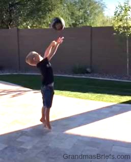 four year old playing basketball