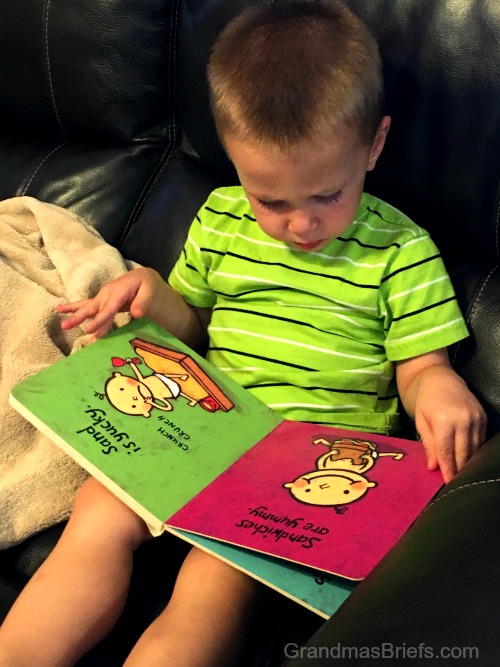 toddler and book