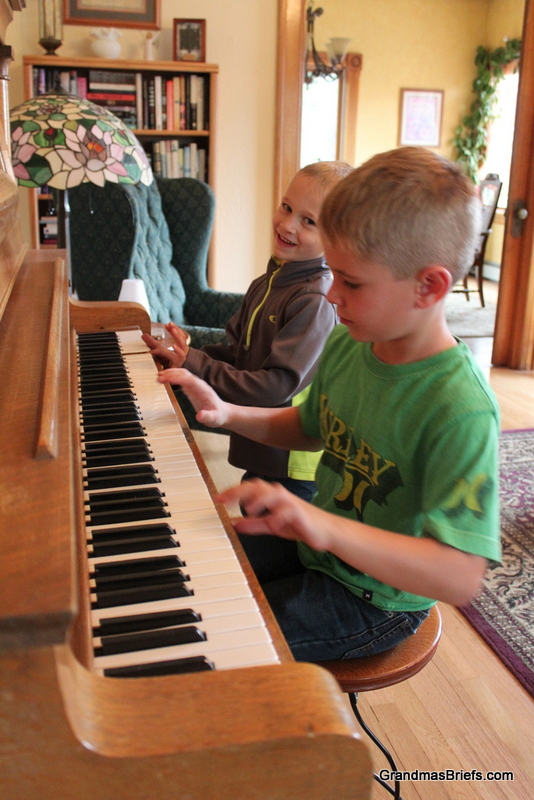 brothers on grandma's piano