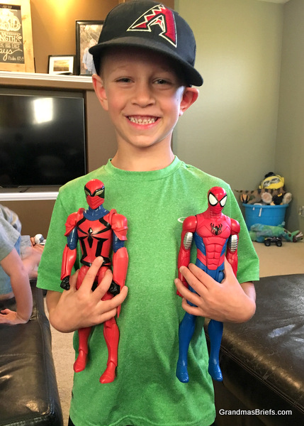 six year old with spider man and spider knight