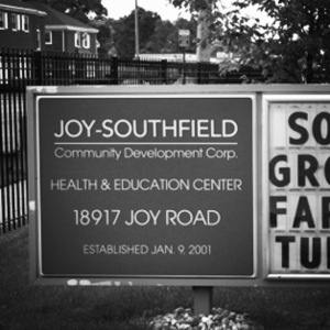 Photograph of the Joy Southfield Community Development Corporation's sign for their Health and Education Center on Joy Road
