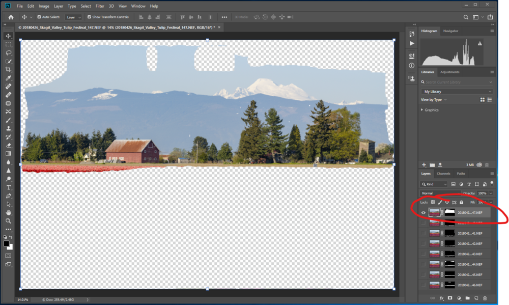Highlight the sky layer and drag it to the top of the layer stack in Photoshop.