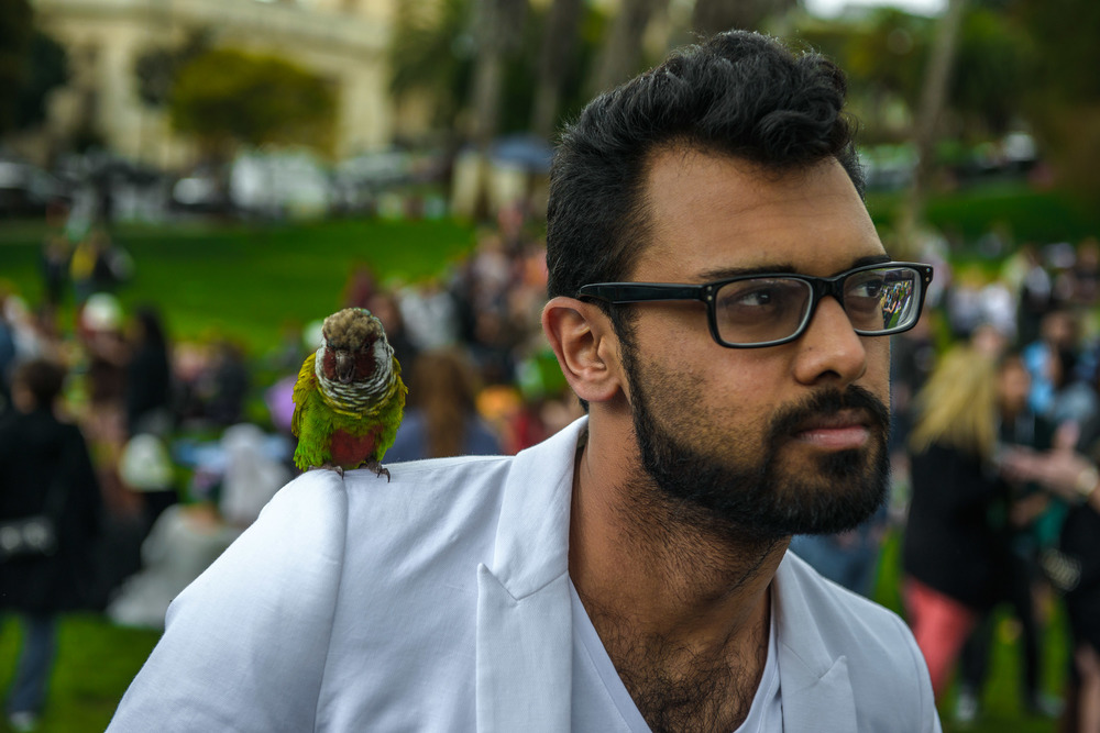 Man with Tiny Parrot