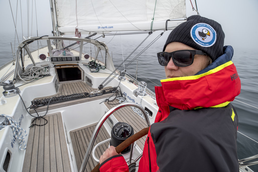   Mia at the helm of Isbjorn's first shakedown sail on April 20 in Sweden.  