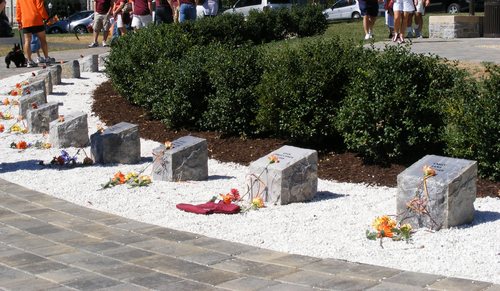 Click photo to download. Caption: On the Virginia Tech campus, a permanent memorial to the 2007 shooting massacre at that school. Credit: Wikimedia Commons.