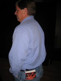 Jim suavely sporting PRETTY GIRLS in his back pocket