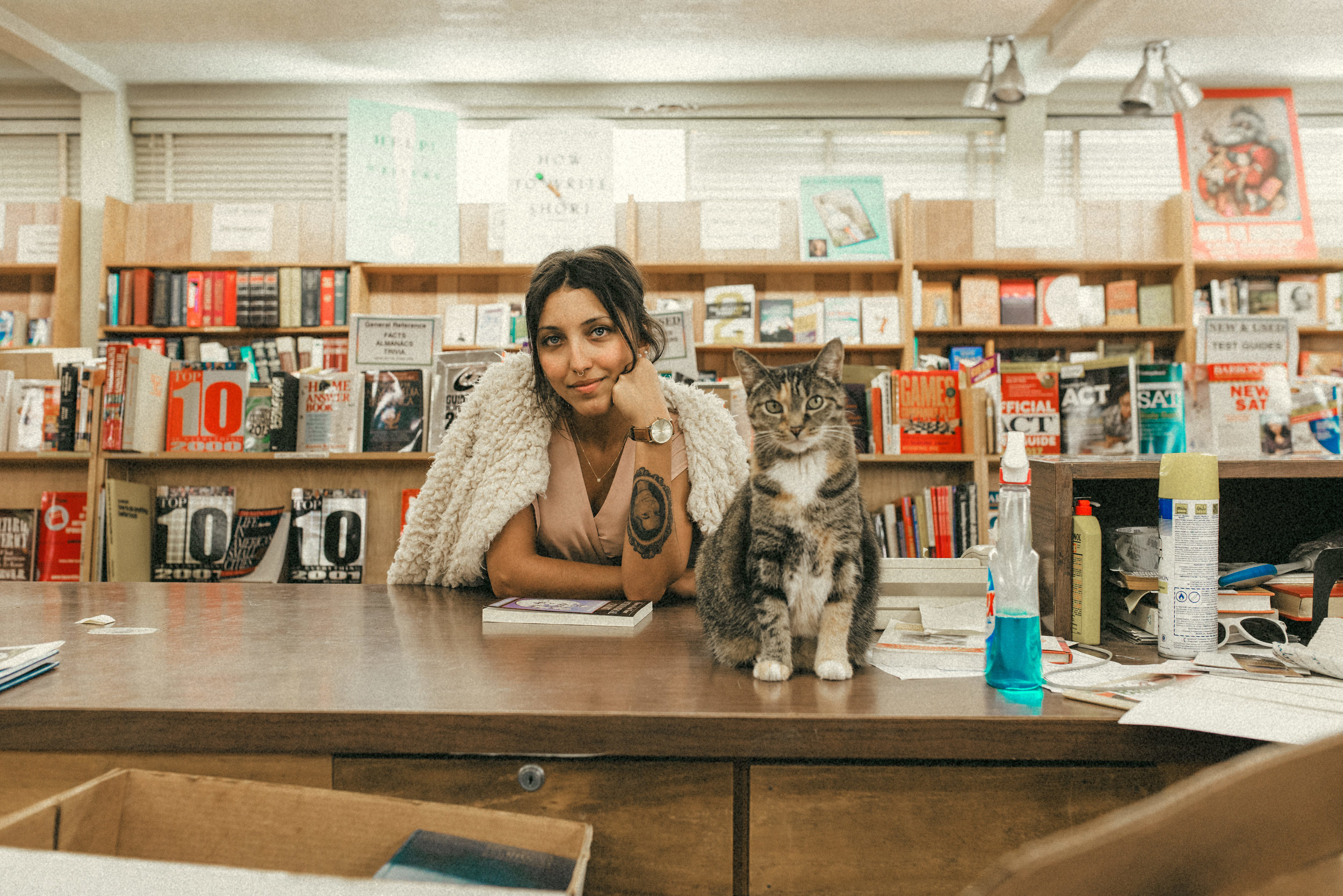 Hillary with the bookstore cat - couple portraits - st pete florida - naples florida wedding photographer - tampa wedding photographer