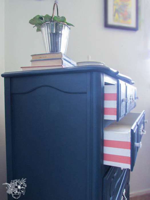 Gorgeous navy dresser with pink and white striped drawers. Pocketful Of Posies