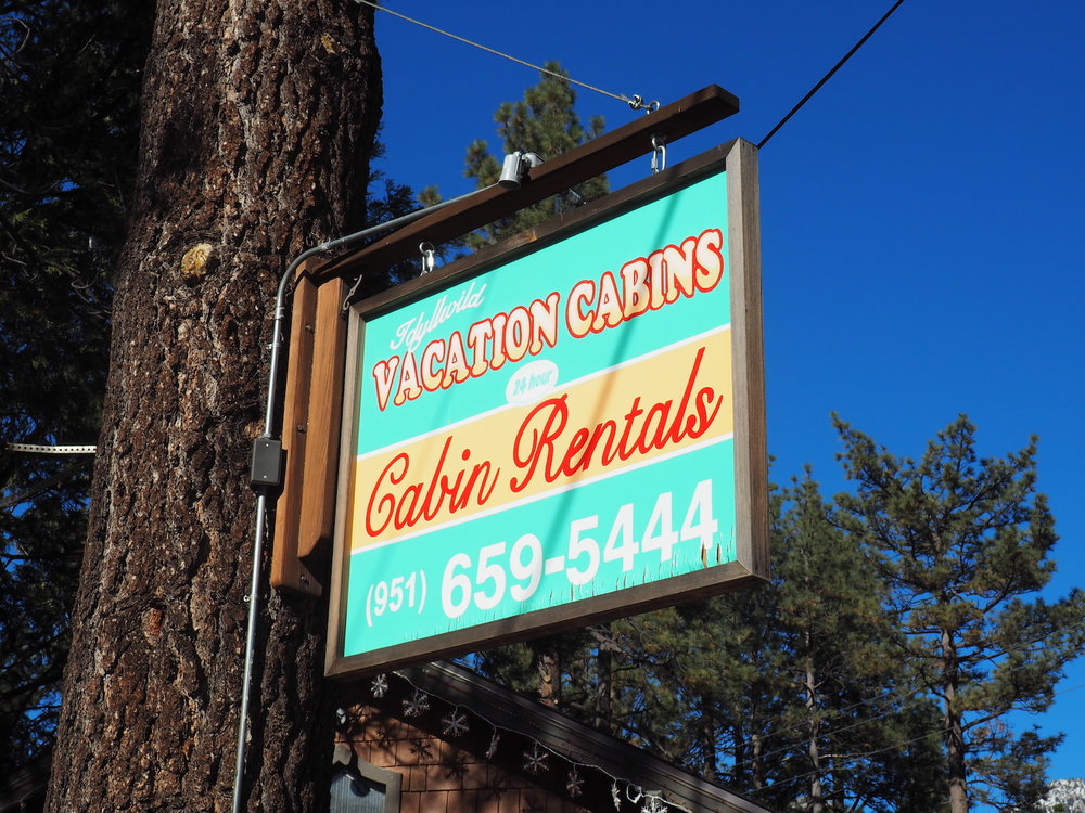  Sign from the Idyllwild Vacation Cabins storefront in the town of Idyllwild, CA. 