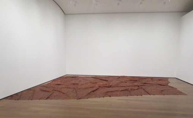   A Flor de Piel  (2013), by Doris Salcedo. Harvard Art Museums, Cambridge, MA. Measuring approx. 11 ft. x 16.5 ft., this tapestry is comprised of thousands of treated and preserved, hand-stitched rose petals and intended as a shroud for a nurse who was kidnapped and tortured to death. 