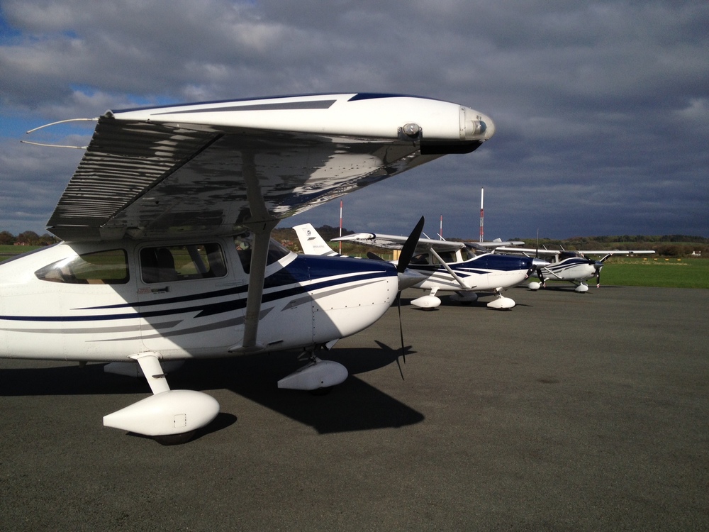  Three Cessna aircraft lined up during a land-away from a solo navigation sortie&nbsp; 