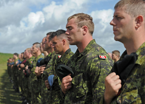  Prime Minister Justin Trudeau speaks with Canadian Armed Forces members participating in Operation LENTUS in Lamèque, New Brunswick on February 3,&nbsp; 2017. As with most election promises, keeping them once in power is always difficult to do. (wo jerry kean, dnd) 