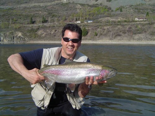 Don Freschi holding a Big Columbia River Rainbow