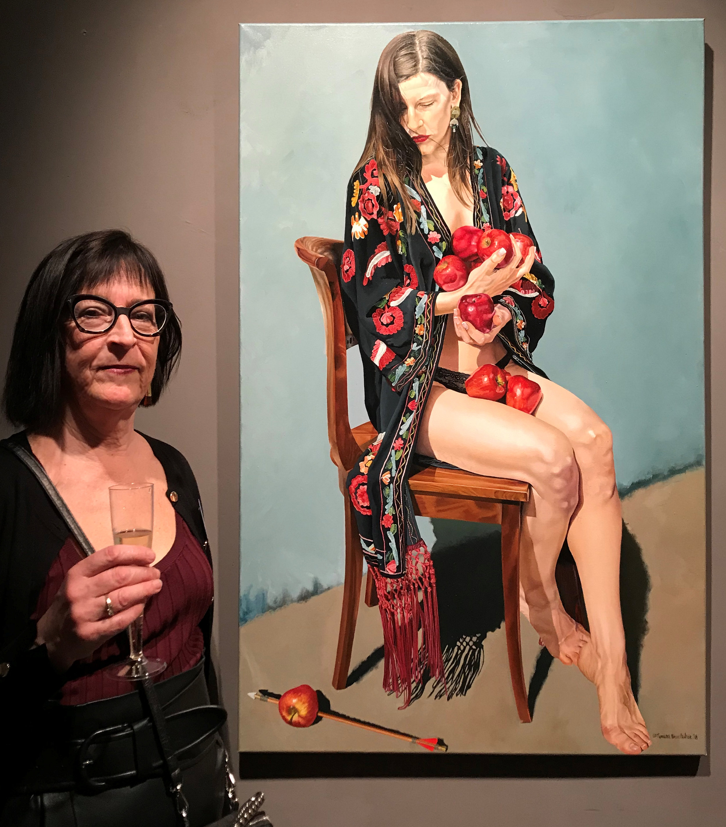 Teresa Brutcher next to her painting entitled  William won’t tell