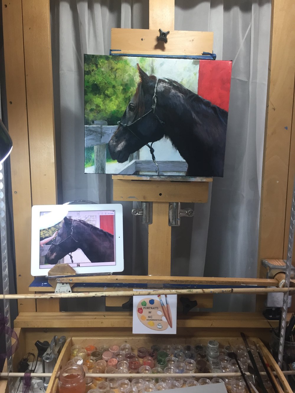 horse painting on easel