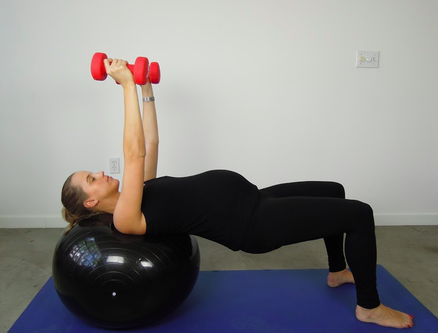 Gluteal bridge on ball with chest press