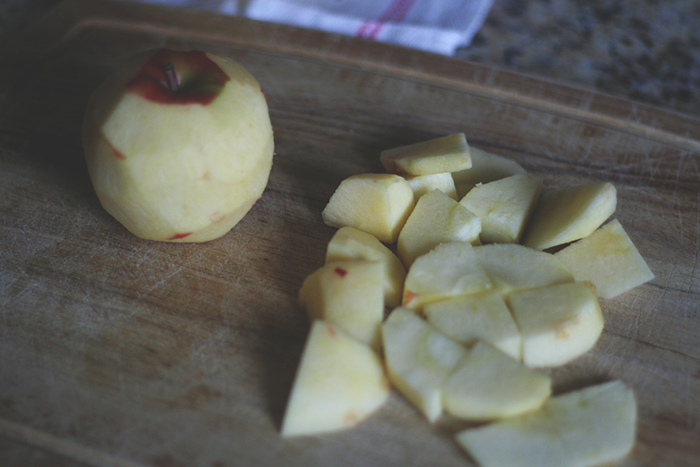 Start with peeling and chopping your apples (we used 4 Gala apples). Don't worry about the cores too much, you'll strain them out anyway. 