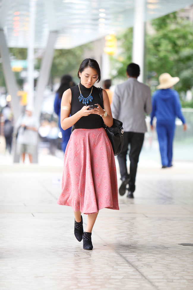 Lady-like with an edge. If midi skirts are too cutesy for your liking pair one with your favorite leather boots and you've gone from classy to sassy. 