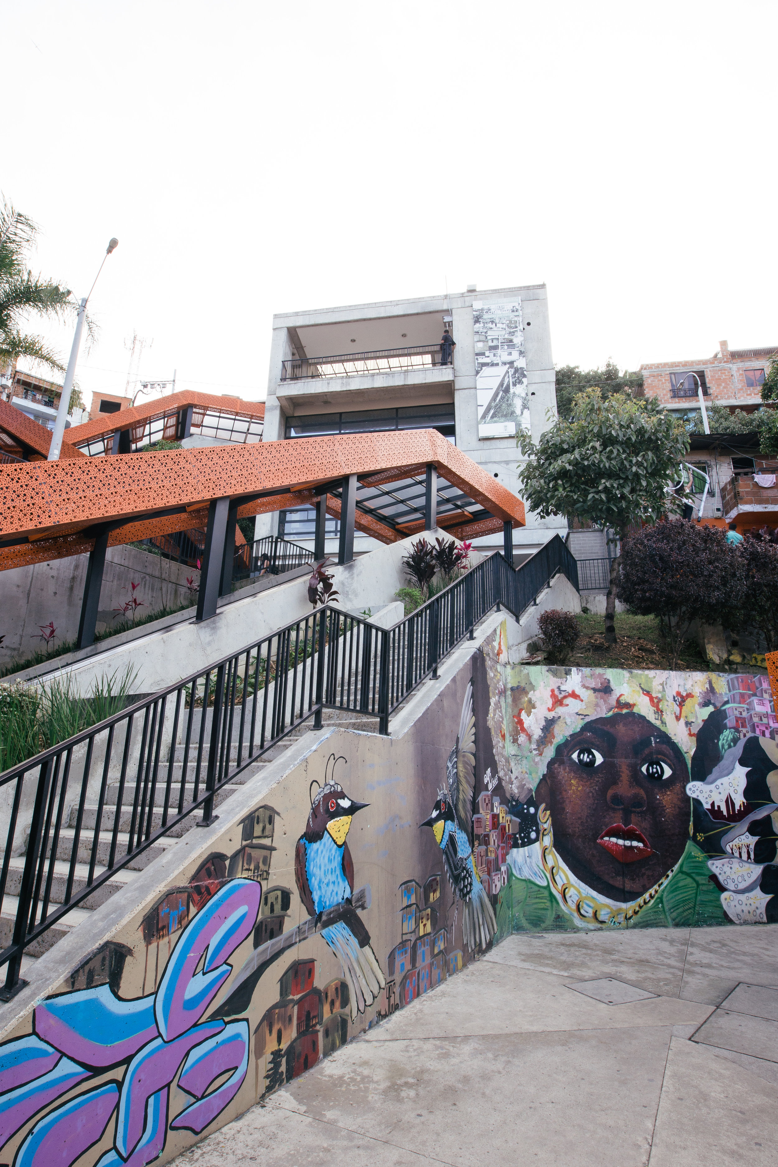 Six escalators scaling 384 meters run the hills in Comuna 13, a once dangerous and inaccessible area run primarily by drug traffickers and guerillas. It's an innovative urban project that has helped open the neighbourhood to new people and fresh ideas, and allowed tourism and enterprise to grow. 