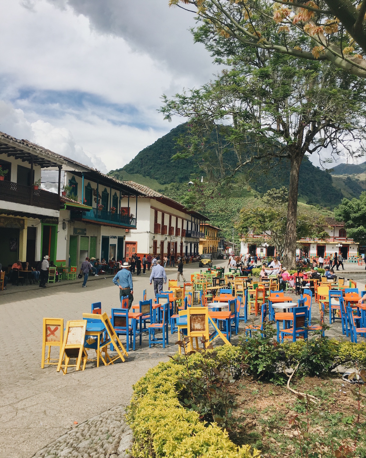  Colourful tables and chairs in the main square of Jardín. 