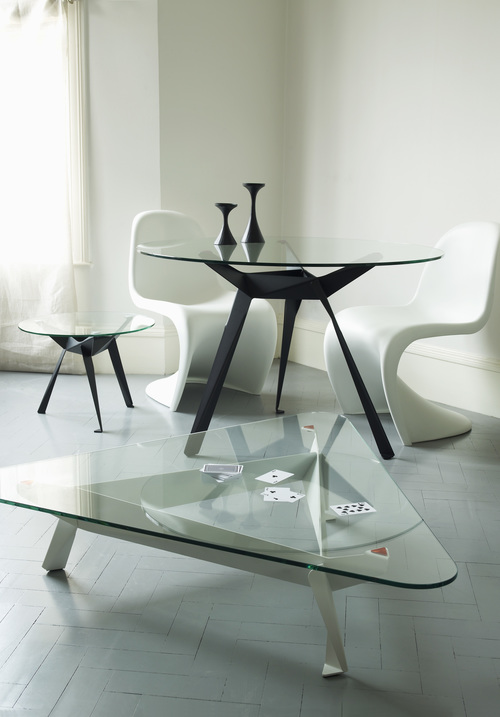  The inspiration for the Origami table came from African hand-carved tripod tables. The aim was to create a contemporary, industrially produced version in a more efficient way.&nbsp; 