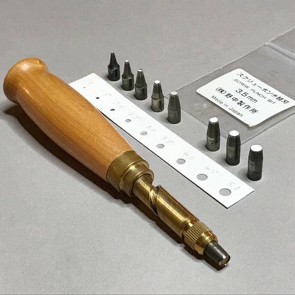  One of my favorite hand tools, the Japanese screw punch. It comes with 9 brass bits that bite through paper, binder’s board, cloth and leather like butter. Mine gets a rough workout, as I use it to create hundreds of tiny holes in my burned paper wall sculptures.&nbsp;Kelly M. O'Brien ©2018 