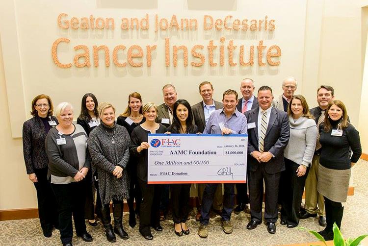 The F4AC Board shown here at the AAMC check presentation ceremony