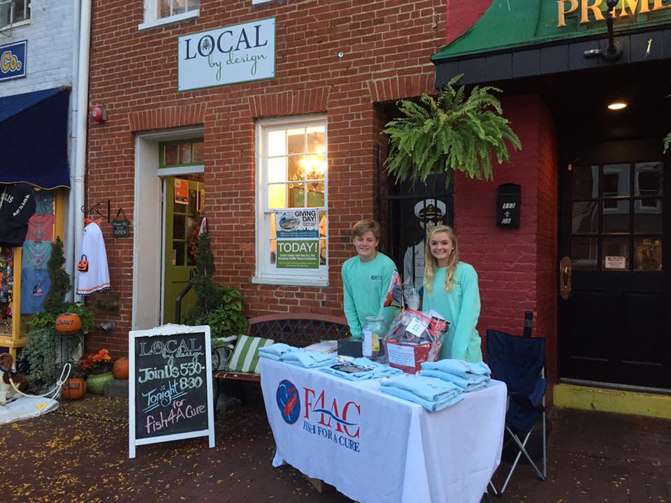 Members of the f4ac Junior board SELLING shirts at our Citizen pride & lOCAL by Design sponsored fundraiser event in late October. every little bit helps throughout the year for f4AC!